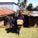 "Little" John Mit Patenpost Von Seiner Patenfamilie Und Seinem Co Paten John KOSGEI